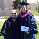 Kelly Zavanti with Trish Berger in graduation cap and gown